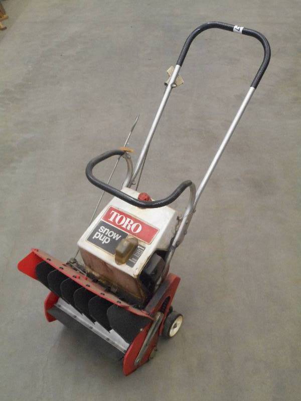 lot 127 image: Toro Snow Pup Gas Powered Snow Blow...