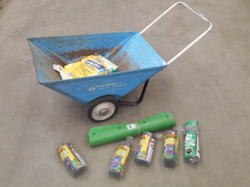 lot 128 image: (1) Yard Cart With Assorted Leaf Co...