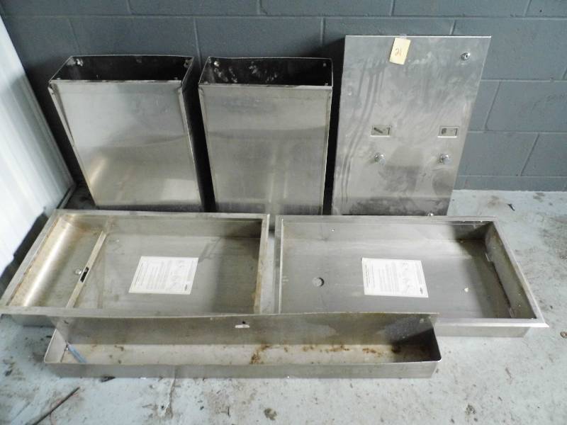 lot 21 image: Sanitary Napkin Dispser & Garbage Cans