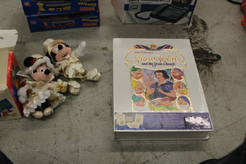 lot 70 image: Lot of (2) Collectibles,Electronics Including 1) Snow White Video Collection (Sealed) AND 1) MickeyMinne Mouse Figurines