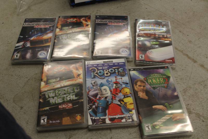 lot 75 image: Lot of (7) PSP Games