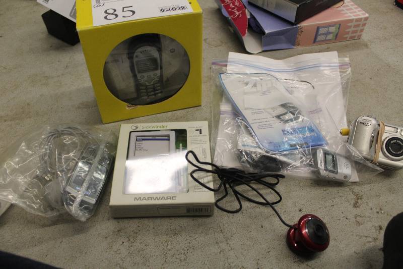 lot 85 image: Lot of (6) Electronics Including 1) Sidewinder MarWare iPod Case AND 1) Coolpix 2100 Digital Camera AND 1) Motorola Nextel Cell Phone AND 1) And More