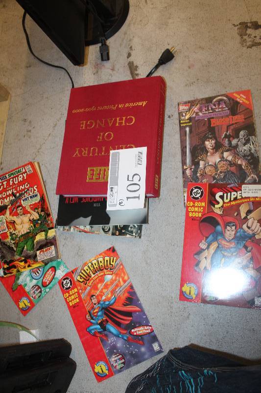 lot 105 image: Lot of (8) Books Including 7) CD-ROM Comic Books AND 1) Life Century of Change America In Pictures 1960-2000