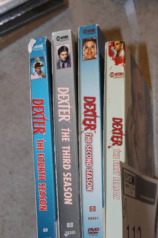 lot 113 image: Lot of (4) DVD Dexter Season 1-4