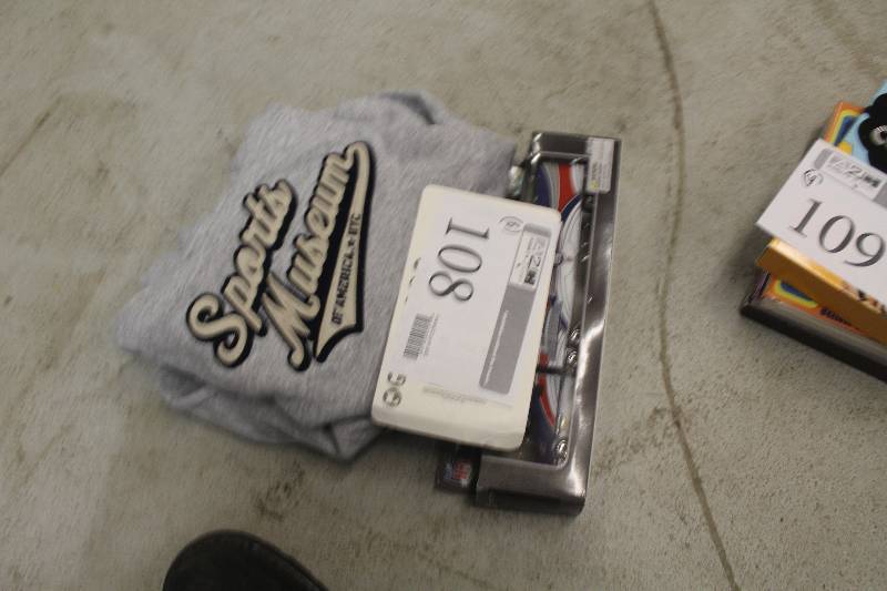 lot 108 image: Lot of (6) Sports Memorabilia Including 1) Sports Museum Sweat Shirt AND 1) NY Giants Die-cast Truck AND 1) Topps 2008 NY Giants Football Cards Count 12 AND 3) Eye Patches