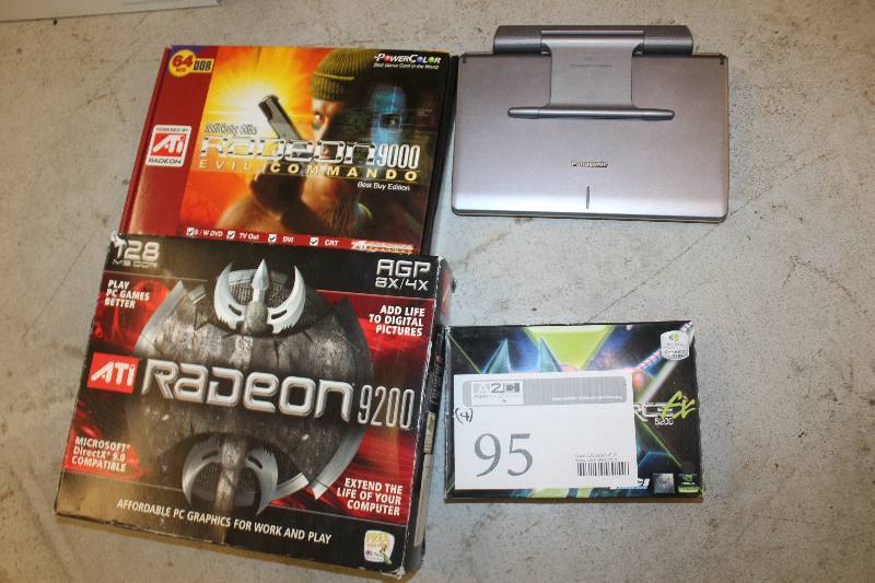 lot 95 image: Lot of (4) Electronics Including 1) Radeon 9000 Game AND 1) Radeon 9200 Game AND 1) GeForces 5200 Game AND 1) Panasonic Portable DVDCD Player Model DVD-LS90