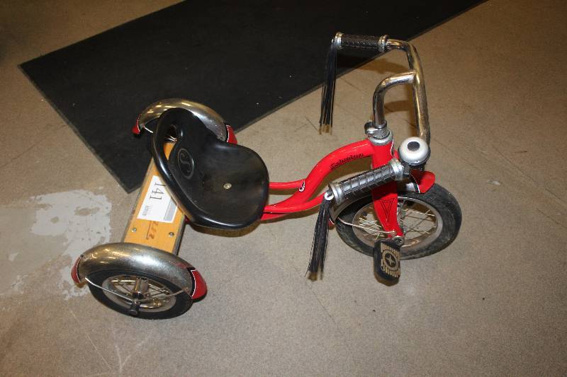 lot 141 image: Red Schwinn Tricycle