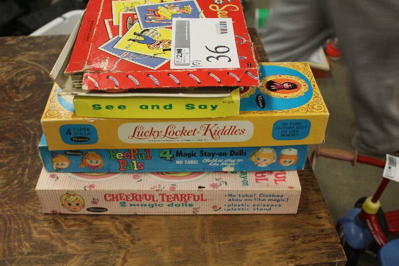 lot 36 image: Lot of (10) Board Games Including See And Say Lucky Locket Kiddles Peepul Pals Cheerful Tearful Magic Dolls 6 Sewing Cards From Mother Goose