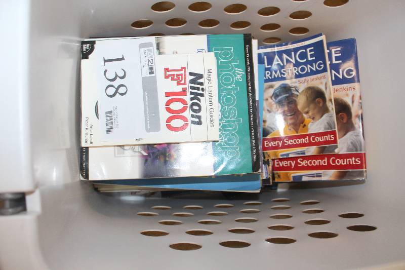 lot 138 image: Box Lot of Books Including Nikon F100 The Photoshop Lance Armstrong And More