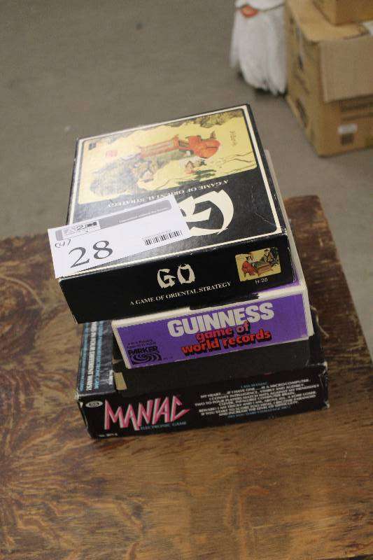 lot 28 image: Lot of (4) Board Games Including Maniac JumPin Guinness Game of World Records Go