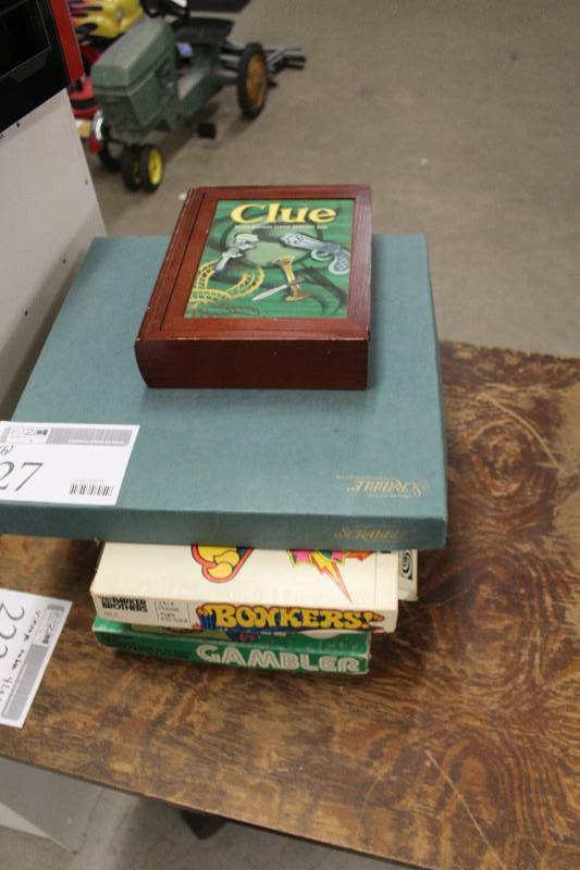 lot 27 image: Lot of (6) Board Games Including Clue Scrabble Bonkers Avalanche Gambler Russian Roulette