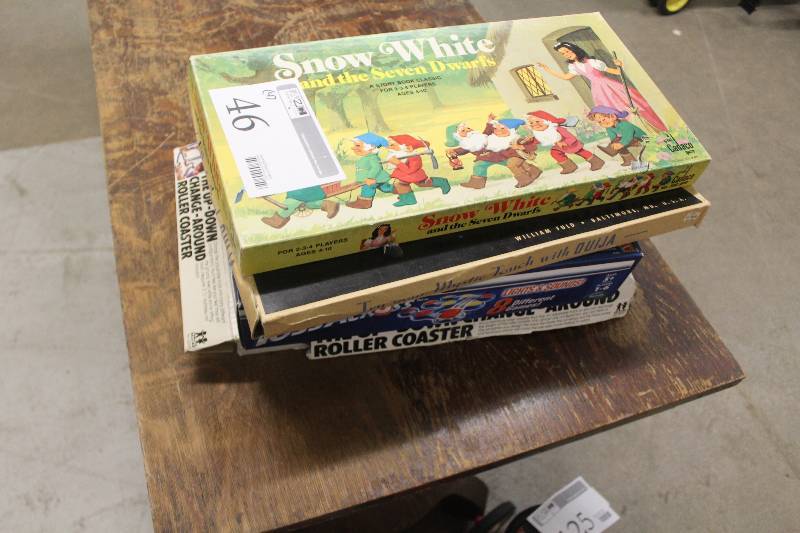 lot 46 image: Lot of (4) Board Games Including Ouija Snow White Toss Across The Up-Down Change-Around Roller Coaster
