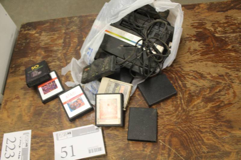 lot 51 image: Lot of Atari Gaming Console w Games