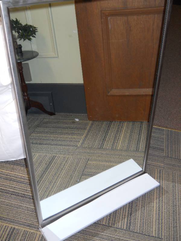 lot 4 image:  BOBRICK Commercial Mirror with Bracket  New  Glass has minor blemish DIMENSIONS 24 x 36
