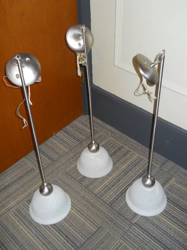 lot 57 image: THREE (3) Ceiling Mount Pendant Lights with Frosted Shades. 33H with 8.5 diameter shades