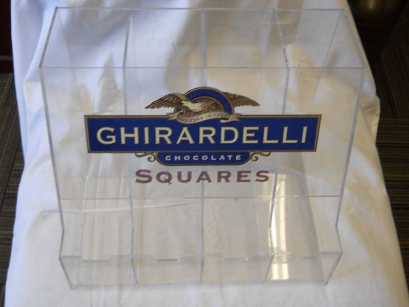 lot 64 image: Acrylic GHIRARDELLI Chocolate Square Dispenser, Countertop, FOOTPRINT 16 x 11