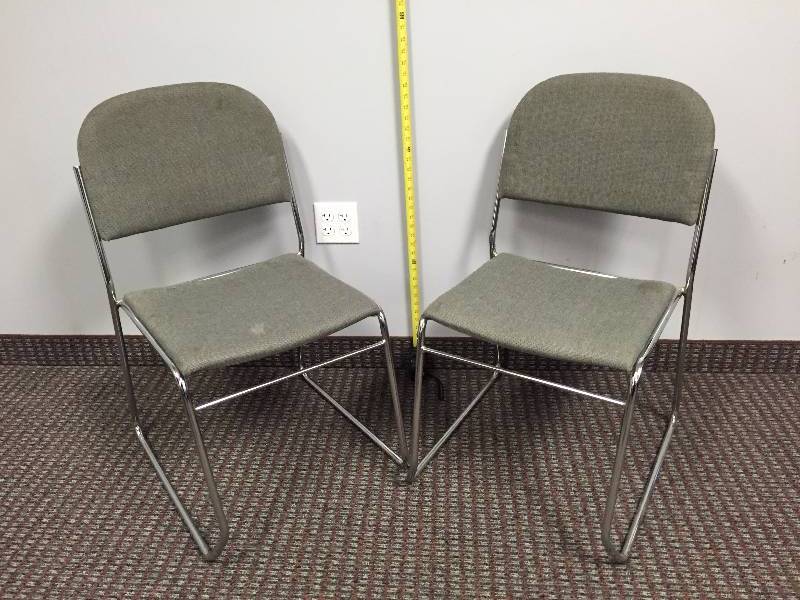 lot 54 image: Sleek Chrome & Charcoal Fabric Stacking Sled Base Office Waiting Room Side Chair - Some Staining On Fabric - Should Clean Up