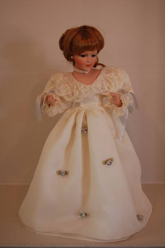 lot 1 image: Porcelain Doll