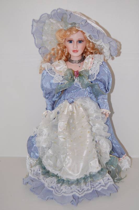 lot 3 image: Porcelain Doll