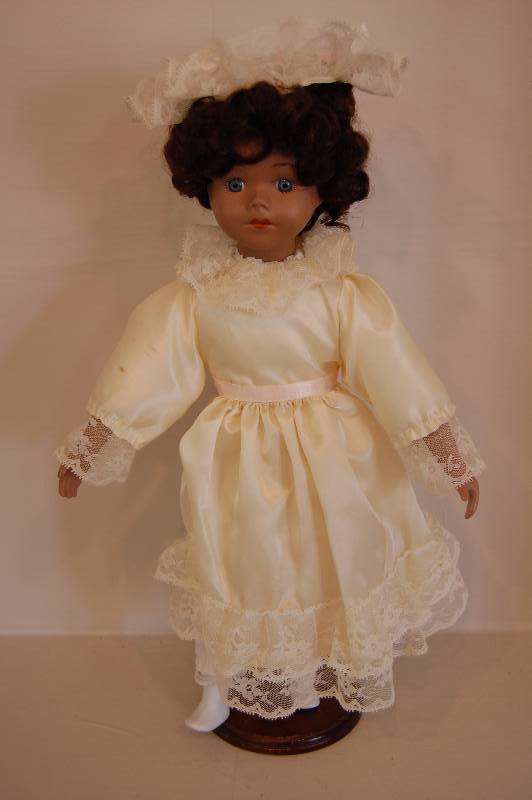 lot 10 image: Porcelain Doll