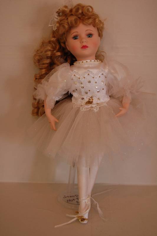 lot 11 image: Porcelain Doll