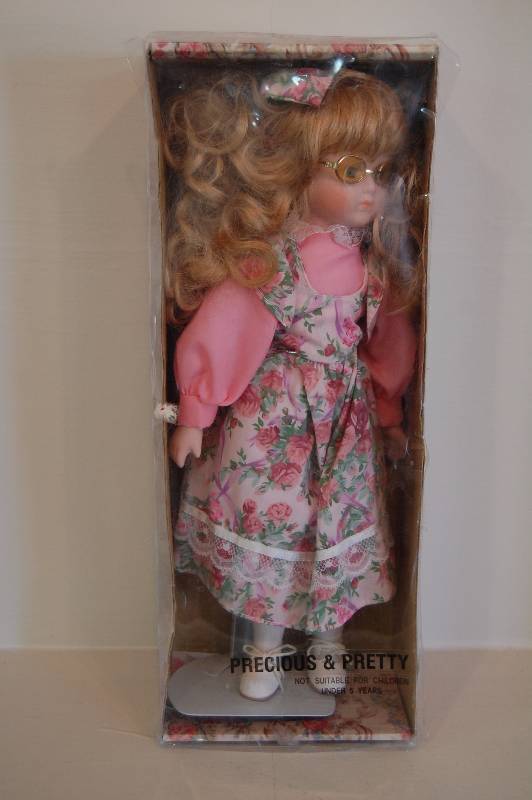 lot 15 image: Porcelain Doll