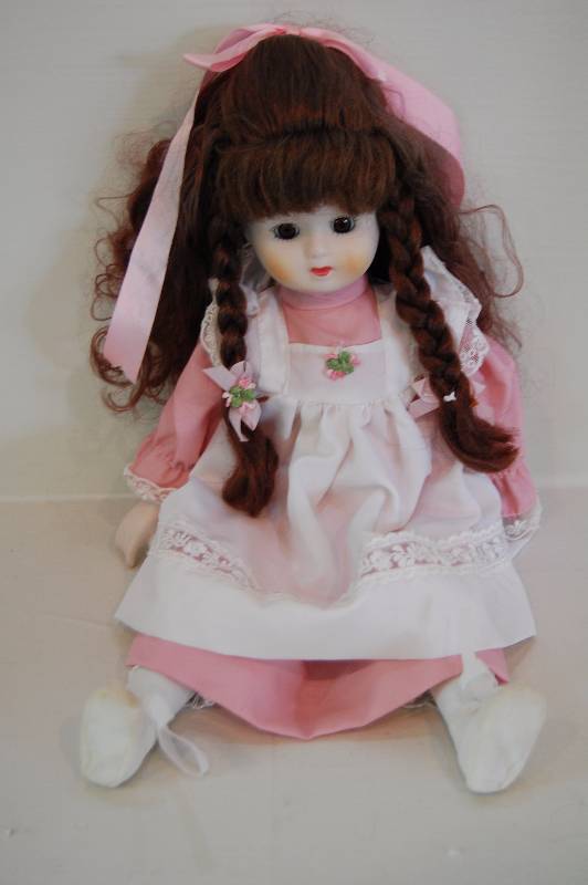 lot 20 image: Porcelain Doll