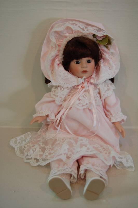 lot 21 image: Porcelain Doll
