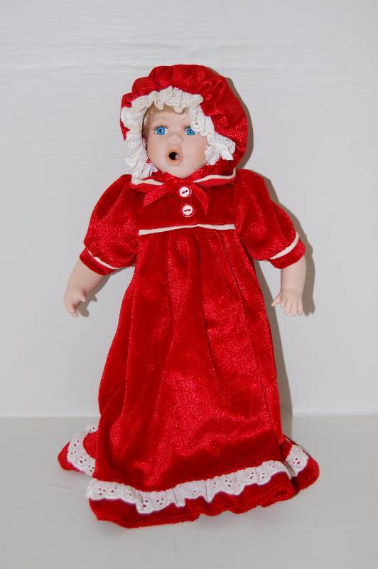 lot 24 image: Porcelain Doll