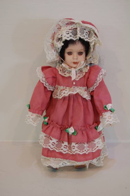 lot 27 image: Porcelain Doll