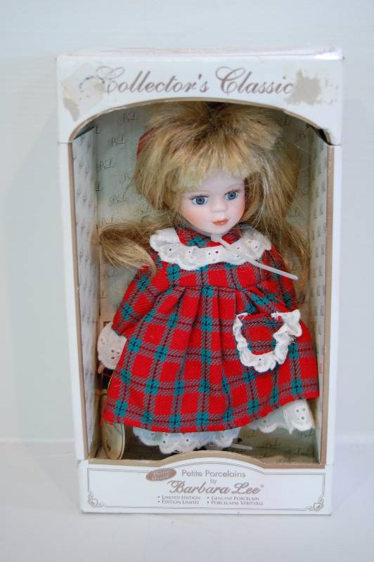 lot 28 image: Porcelain Doll