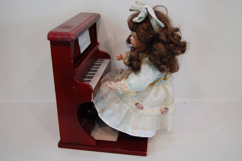 lot 29 image: Porcelain Doll