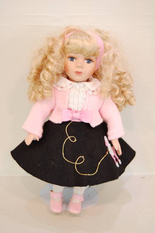 lot 30 image: Porcelain Doll