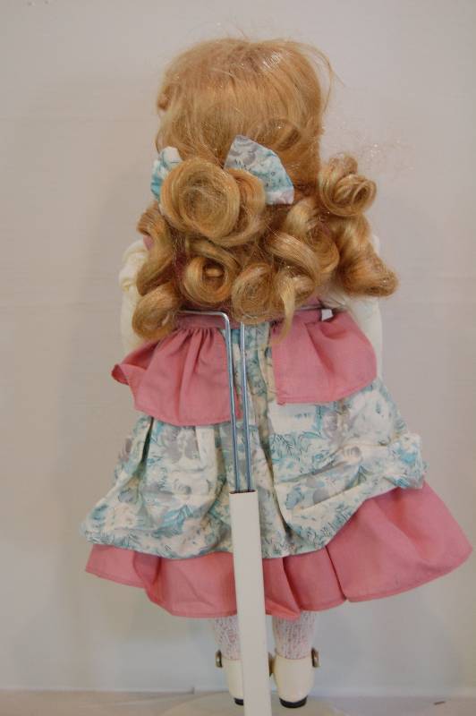 lot 33 image: Porcelain Doll