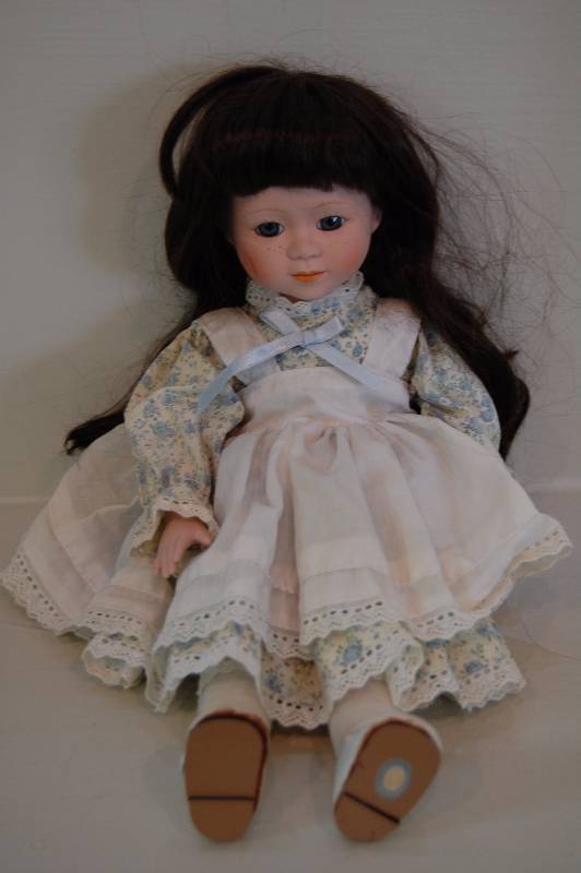 lot 34 image: Porcelain Doll