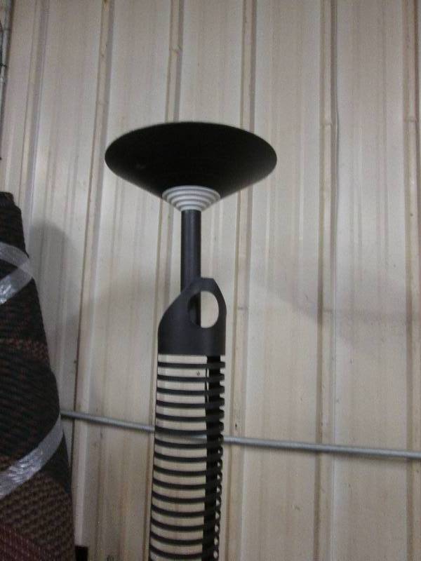 Tall black metal electric floor lam...