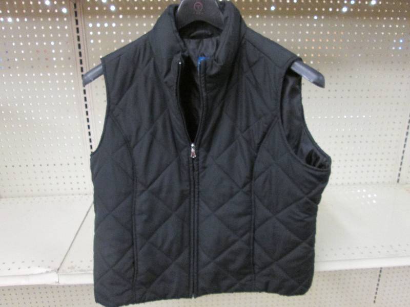 Black quilted zip vest, no size giv...