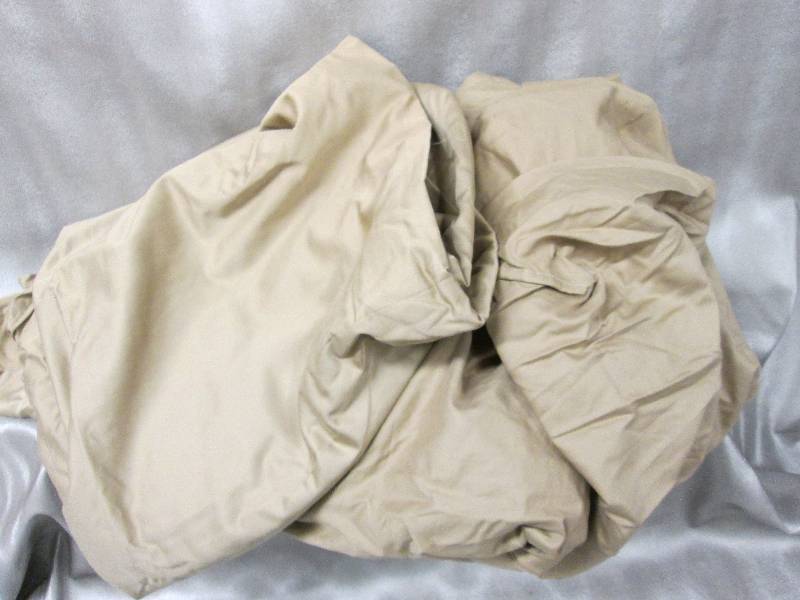 1 flat, 1 fitted gold colored sheet...