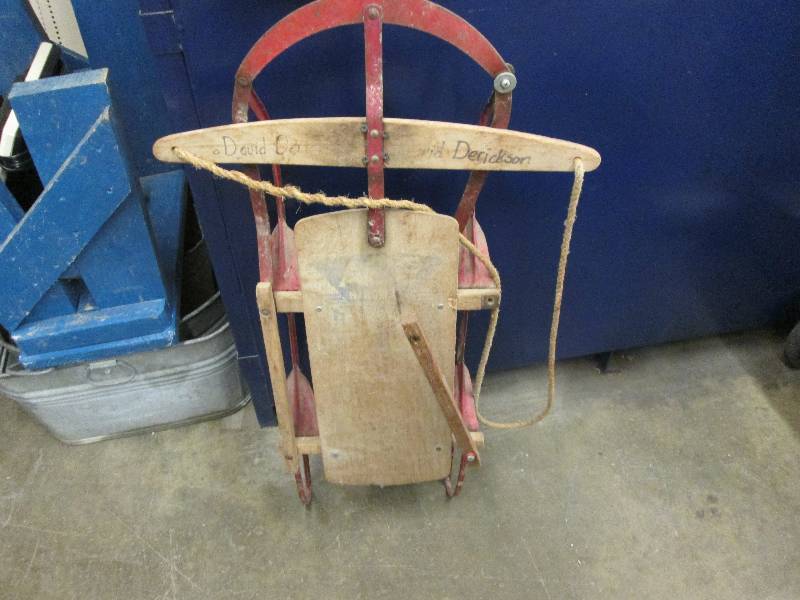 Vintage red woodmetal sled...