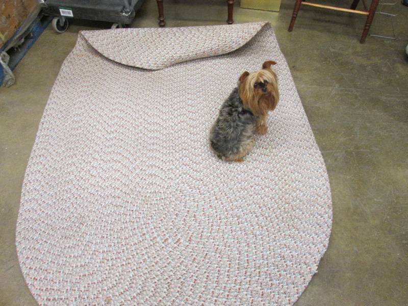 Oval braided rug 78x48 inches...