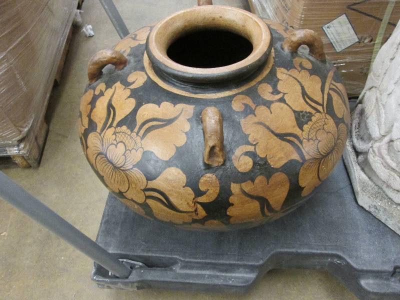 Black brown pottery type urnpot...