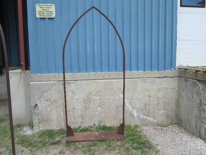 Metal garden arch with sturdy base...
