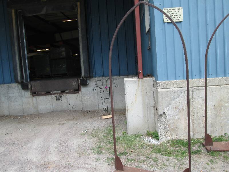 Metal garden arch with sturdy base...