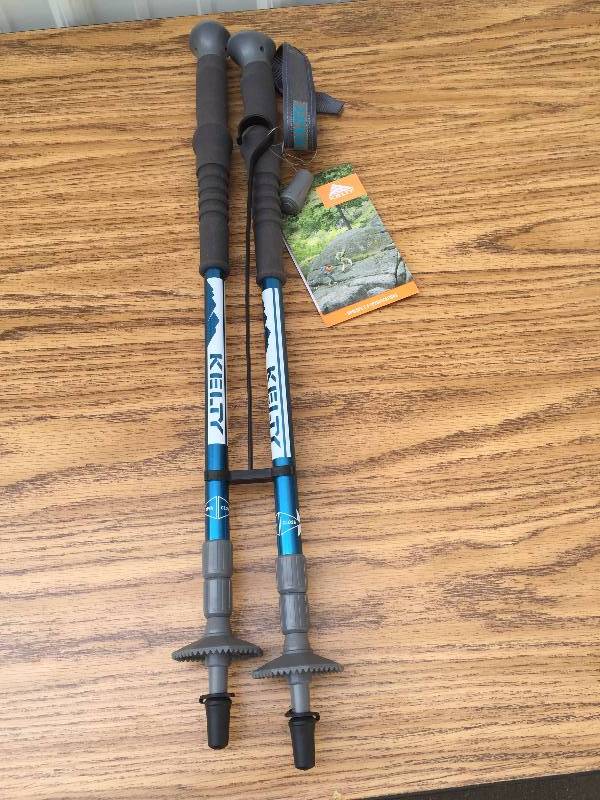 lot 26 image: Kelty adjustable Walking Sticks