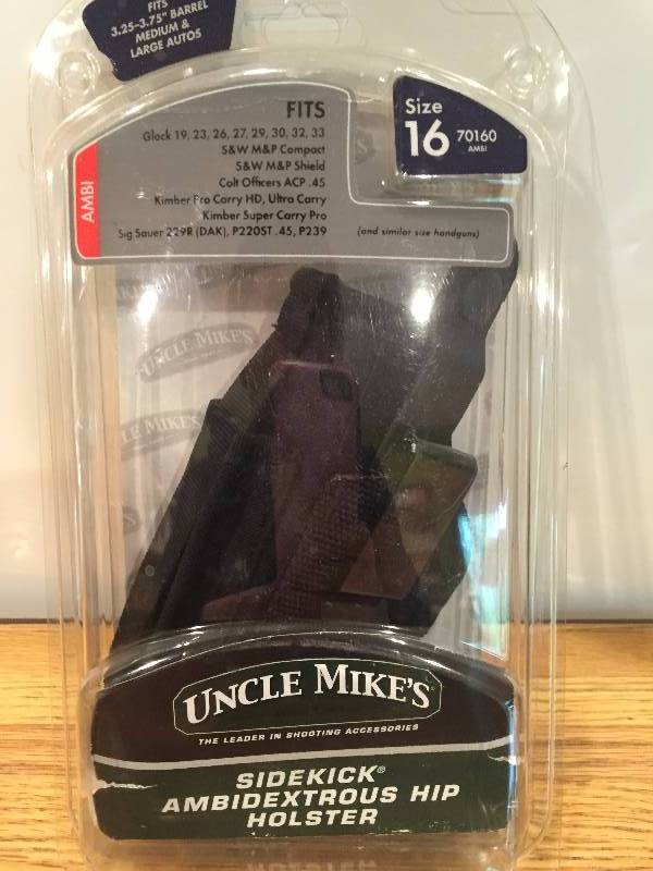 lot 86 image: Uncle Mikes Sidekick Ambidextrous Hip Holster