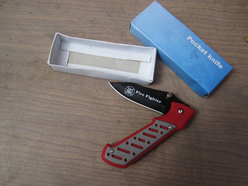 lot 11 image: Firefighter pocket knife, new...