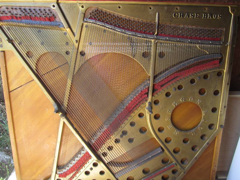 lot 24 image: Chase Bros. piano stringboard.  Pla...