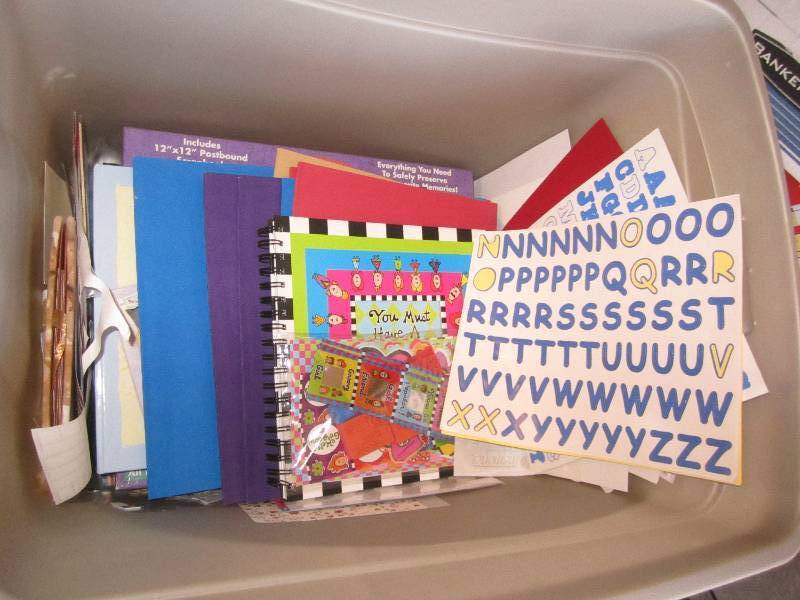 lot 79 image: 18 gal bin 3-4 full of scrapbooking...