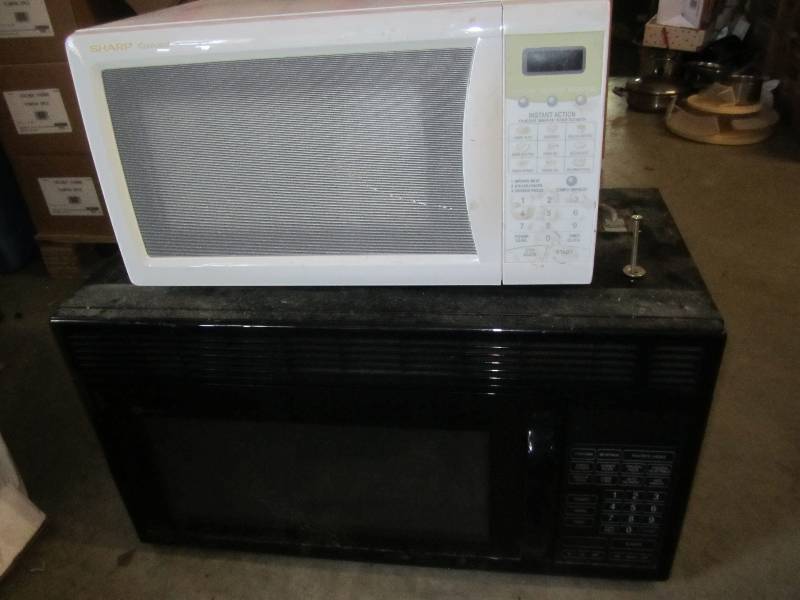 lot 82 image: Countertop Sharp microwave and Mayt...