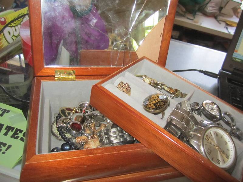 lot 86 image: small jewlrey box filled with jewle...